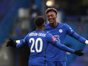 Tammy Abraham of Chelsea celebrates with team mate Callum Hudson-Odoi. (Photo by Catherine Ivill/Getty Images)