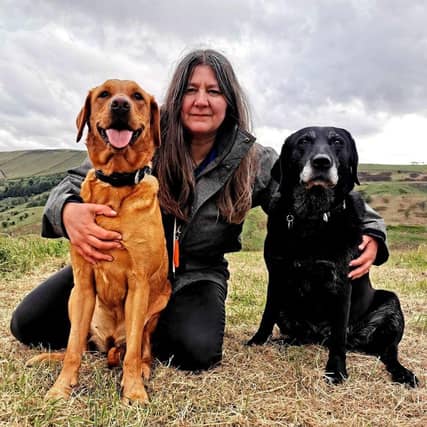 Rachel Bean with her dogs Chilli and Wisp, Rachel is the UK's leading canine first aider - Animal News Agency