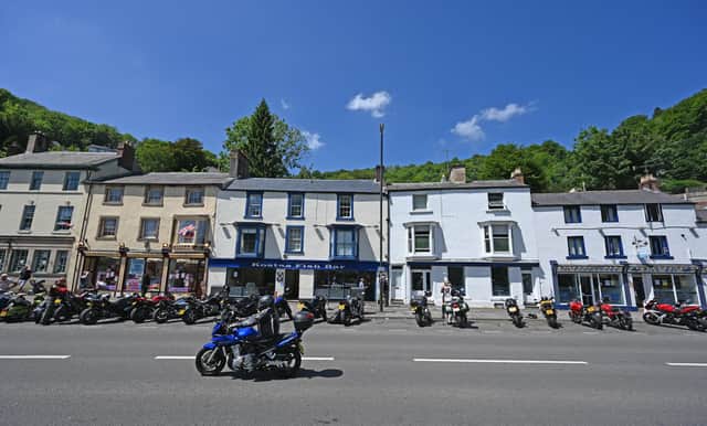 A familiar sight: Motorcyclists park their bikes on the road in Matlock Bath in the Peak District in northern England. (Photo by PAUL ELLIS/AFP via Getty Images)