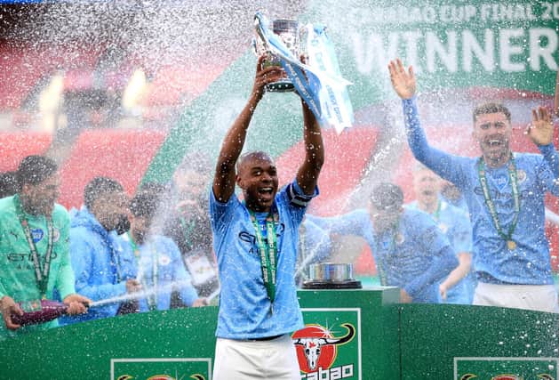 Manchester City's Fernandinho lifts the trophy as he celebrates winning the Carabao Cup Final at Wembley Stadium, London. (Photo: Adam Davy/PA Wire)