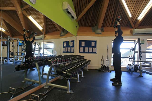 A man works out in a indoor gym at a reopened sports and fitness centre in Scunthorpe, as coronavirus restrictions are eased after England's third national lockdown on April 12.
