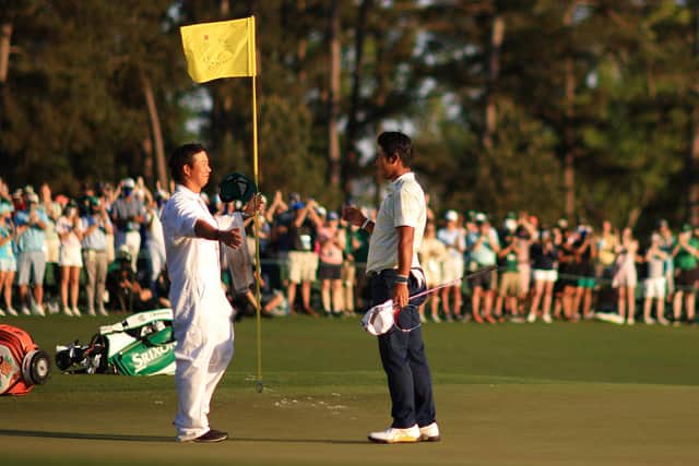 Golfer Hideki Matsuyama and caddie Shota Hayafuji celebrate Masters 2021 victory. (Pic: Getty Images)