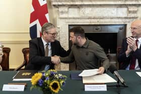 Prime Minister Sir Keir Starmer shakes the hand of Ukrainian President Volodymyr Zelensky  after he addressed an extraordinary meeting of the UK Cabinet at 10 Downing Street last month. 