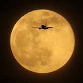 Supermoons appear bigger and brighter in the sky because they are slightly closer to the Earth (Getty Images)