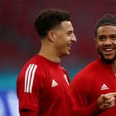 Ethan Ampadu and Tyler Roberts of Wales speak during their taining session ahead of the UEFA Euro 2020 Round of 16 match against Denmark at Johan Cruijff Arena on June 25, 2021 in Amsterdam, Netherlands. (Photo by Dean Mouhtaropoulos/Getty Images)