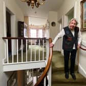 The remarkable Margaret Payne on the stairs of her home in Ardvar, Sutherland. Picture: PA Wire