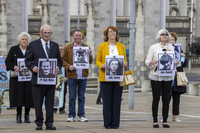 Families of people who were killed at Ballymurphy arrive the International Convention Centre (ICC) in Belfast (PA)