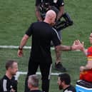 Wales' coach Robert Page celebrates with forward Gareth Baleafter the Italy game in which they secured qualification from Group A.