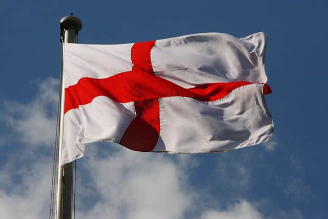 The St George flag is often flown from civic buildings on the national day. (Daniel Berehulak/Getty Images)