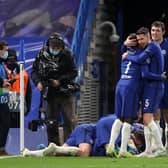 Jorginho, Ngolo Kante, Andreas Christensen and Antonio Ruediger of Chelsea celebrate after Mason Mount (obstructed) scored their team's second goal during the UEFA Champions League Semi Final Second Leg match between Chelsea and Real Madrid at Stamford Bridge.