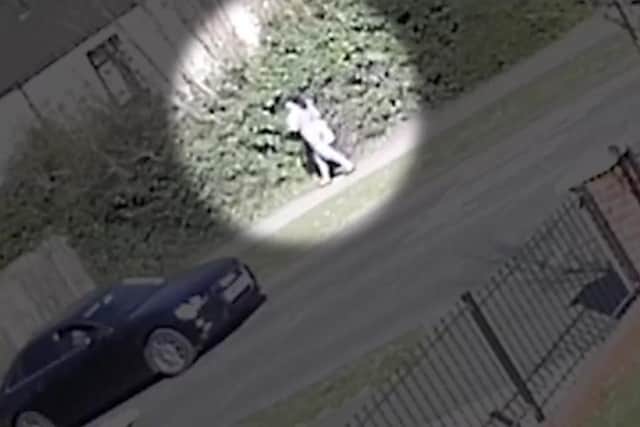 The footage shows a woman walking along Shannon Road (Photo: West Midlands Police)