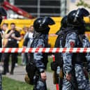 Russian National Guard officers outside school No175 where the attacks were carried out (Getty Images)