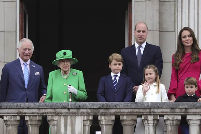 From left, Prince Charles, Queen Elizabeth II, Prince George, Prince William, Princess Charlotte, Prince Louis and Kate, Duchess of Cambridge stand on the balcony, at the end of the Platinum Jubilee Pageant held outside Buckingham Palace today 
Picture: Chris Jackson/Pool Photo via AP