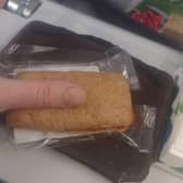 A plane passenger has slammed Aer Lingus after being served the 'world's worst sandwich' - that was missing half its filling and not much bigger than his THUMB.