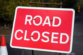 A major road in Cornwall is closed due to a “large number of fallen trees”.