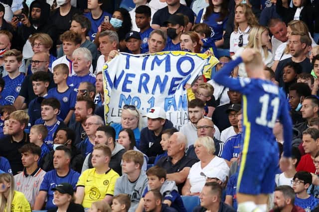 A fan holds up a sign for Timo Werner of Chelsea as he walks past during the Pre Season Friendly match between Chelsea and Tottenham Hotspur at Stamford Bridge on August 04, 2021 in London, England. (Photo by Catherine Ivill/Getty Images)