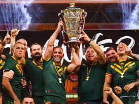 Australian team member's celebrate their victory in the Rugby League World Cup men's final match between Australia and England in Brisbane on December 2, 2017.