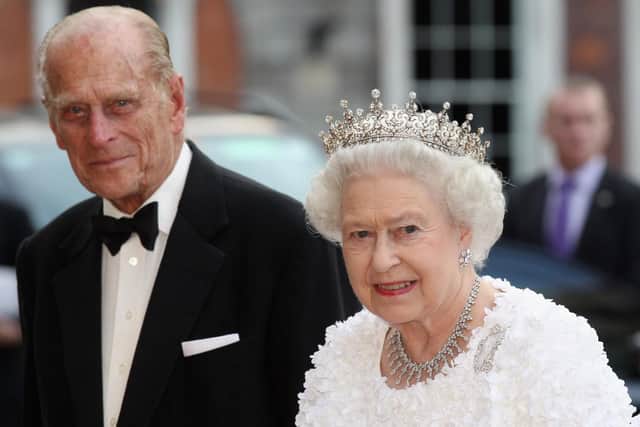Queen Elizabeth II and Prince Philip, Duke of Edinburgh, arrive to attend a State Banquet in Dublin Castle on May 18, 2011 (Getty Images)