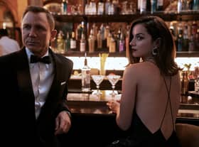 Daniel Craig as James Bond and Ana de Armas as Paloma in No Time To Die PIC: Nicola Dove © 2020 DANJAQ, LLC AND MGM.  ALL RIGHTS RESERVED.