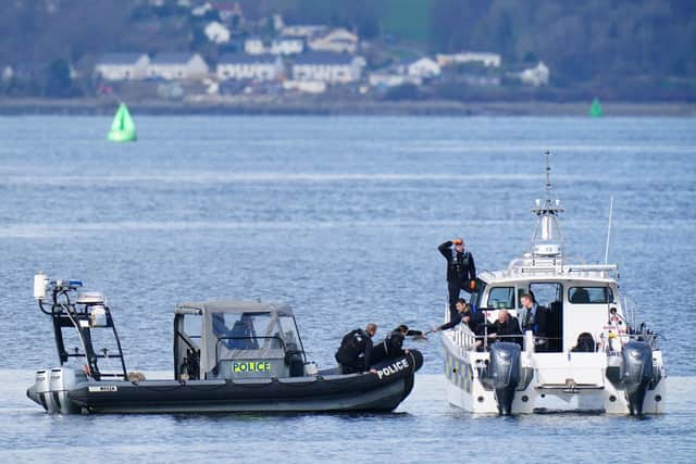 Police boats taking part in the rescue operation in the Firth of Clyde near Greenock (Pic:: Jane Barlow/PA Wire)