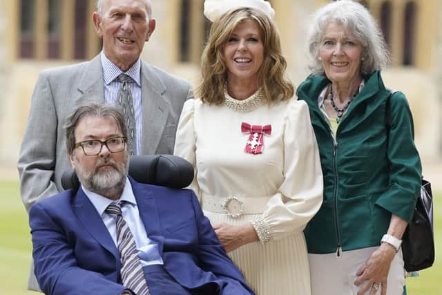 Kate Garraway, with her husband Derek Draper and her parents Gordon and Marilyn Garraway, after being made a Member of the Order of the British Empire by the Prince of Wales at Windsor Castle. Picture by Andrew Matthews/PA Wire