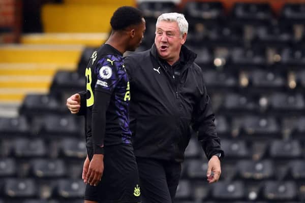 Steve Bruce, manager of Newcastle United, with Joe Willock after the Premier League match between Fulham and Newcastle United at Craven Cottage on May 23, 2021 in London, United Kingdom. (Photo by Marc Atkins/Getty Images)