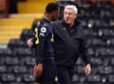 Steve Bruce, manager of Newcastle United, with Joe Willock after the Premier League match between Fulham and Newcastle United at Craven Cottage on May 23, 2021 in London, United Kingdom. (Photo by Marc Atkins/Getty Images)