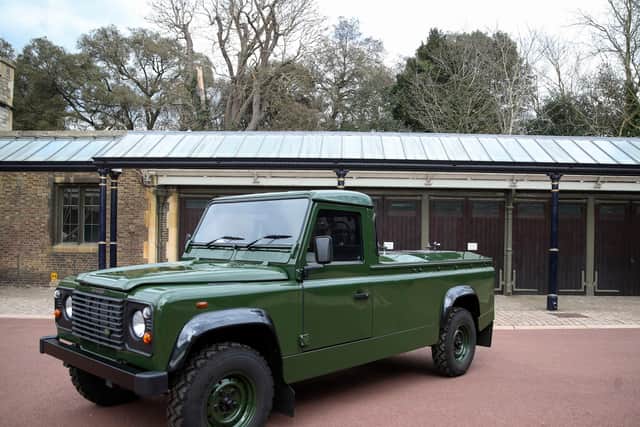 The Land Rover Defender that will be used to transport the coffin of Britain's Prince Philip, Duke of Edinburgh during the funeral procession is parked in Windsor Castle (Photo by STEVE PARSONS/POOL/AFP via Getty Images)