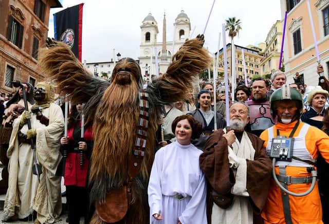 Star Wars fans dress up as characters from the saga on Star Wars Day 2019 (Photo: VINCENZO PINTO/AFP via Getty Images)