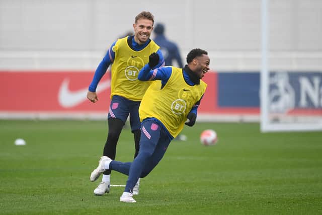 BURTON UPON TRENT, ENGLAND - NOVEMBER 11: Raheem Sterling and Jordan Henderson of England participate in a training session at St George's Park on November 11, 2021 in Burton upon Trent, England. (Photo by Michael Regan/Getty Images)