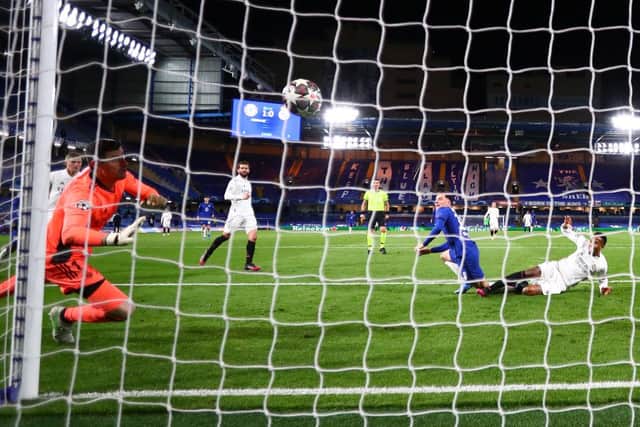 Mason Mount scores Chelsea's second goal past former Blues goalkeeper Thibaut Courtois.