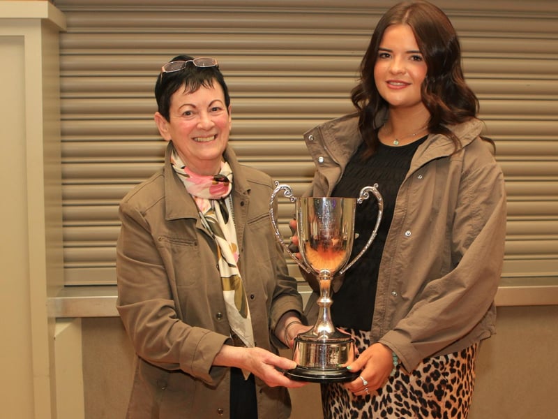 Ruth Montgomery, Clogher Show secretary, pictured with Lexi Heatrick receiving the Valley Hotel Perpetual Cup for Best Heifer Calf born in year of the show for Ballinalare Farm Tikita.
