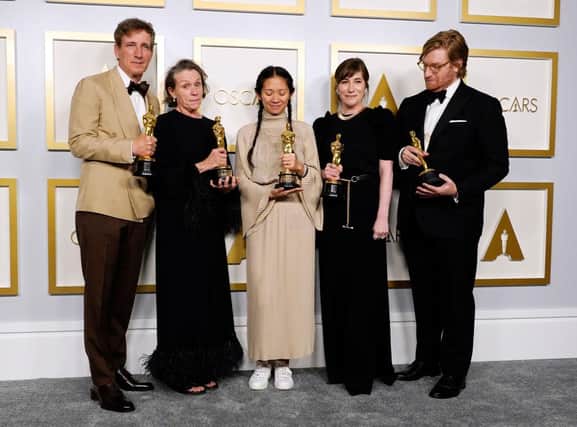 (L-R) Peter Spears, Frances McDormand, Chloe Zhao, Mollye Asher, and Dan Janvey accepted their awards for Best Picture for "Nomadland,"  at the Oscars on Sunday, 25 April 2021 (Picture: Getty Images)