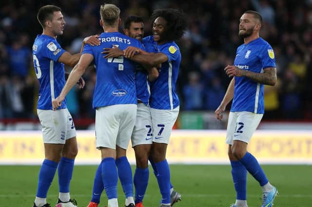 Maxime Colin (C) of Birmingham City celebrates scoring with team-mates during the Sky Bet Championship match between Sheffield United and Birmingham City at Bramall Lane.
