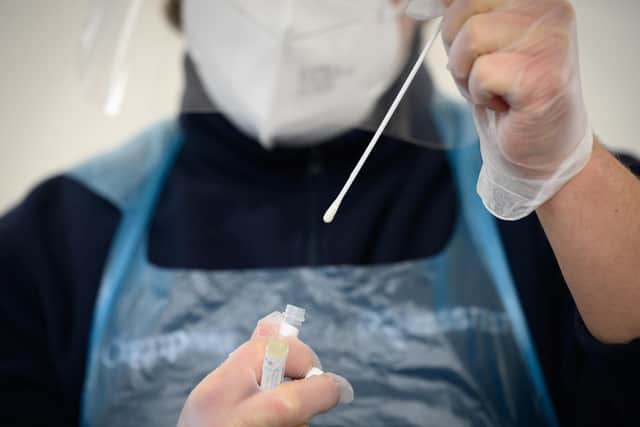 PCR Covid tests are carried out using nasal and throat swab samples (Getty Images)