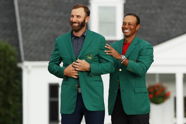 Tiger Woods, who presented Dustin Johnson with the Green Jacket in 2020, will miss the 2021 Masters through injuries sustained in a car crash in California on 23 February. (Pic: Getty Images)