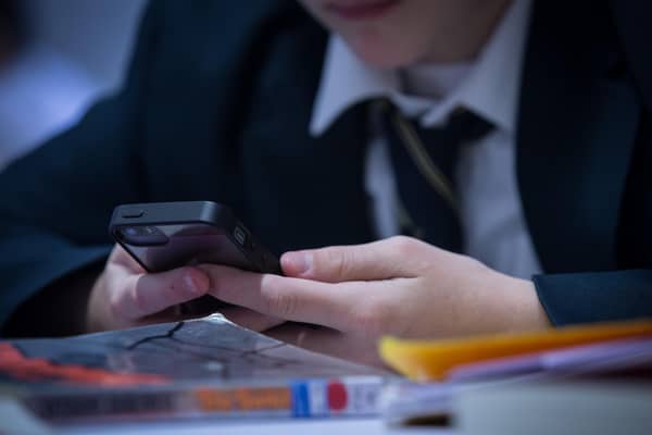 A blanket ban on mobile phones in English schools ditched in Government U-turn (Photo by Matt Cardy/Getty Images)