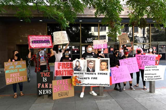 Supporters of Britney Spears joined the #FreeBritney protest outside Los Angeles Courthouse in 2020, to raise concerns over her father's legal rights to make financial and health decisions for her (Picture: Getty Images)