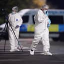 Forensic officers in Horsforth, Leeds, after a 15-year-old boy was taken to hospital in a critical condition after he was reportedly assaulted near a school. Photo: Danny Lawson/PA Wire.