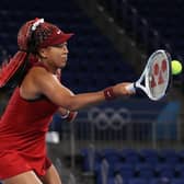Naomi Osaka of Team Japan plays a forehand during her Women's Singles third round match against Marketa Vondrousova of Team Czech Republic on day four of the Tokyo Games (David Ramos/Getty)