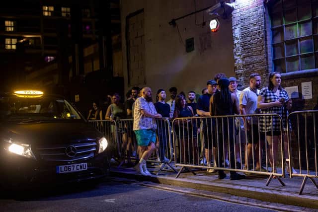 LONDON, ENGLAND - JULY 19: People queue to get in to the Egg London nightclub (Photo by Rob Pinney/Getty Images)