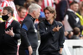 Brentford manager Thomas Frank (R) and West Ham United manager David Moyes talk before the pre season friendly match between Brentford and West Ham United at Brentford Community Stadium.