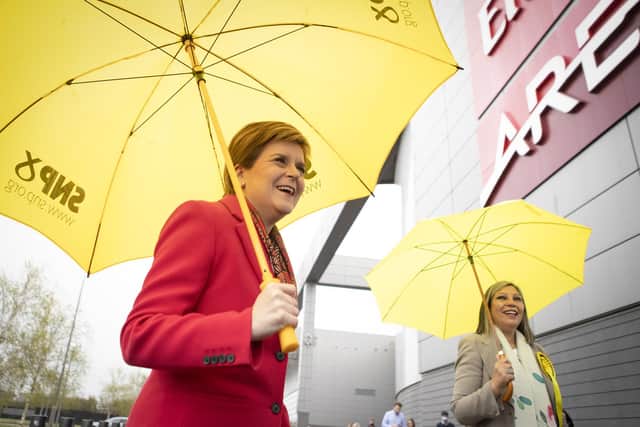 First Minister Nicola Sturgeon (left) with Scotland's first female MSP of colour, Kaukab Stewart, outside the Emirates Arena, Glasgow (Photo: Jane Barlow / PA)