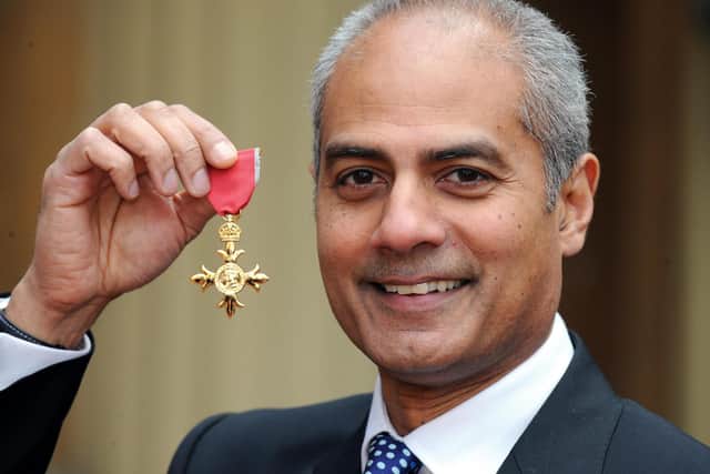 George Alagiah at Buckingham Palace after collecting his OBE from the Queen. Fiona Hanson/PA Wire