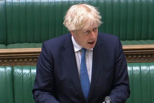 Prime Minister Boris Johnson speaking about the Covid-19 pandemic in the House of Commons (PA)