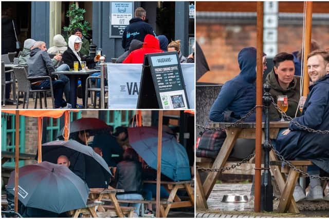 People braved the elements to drink outside in England during the bank holiday (SWNS)