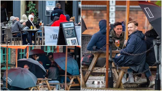 People braved the elements to drink outside in England during the bank holiday (SWNS)