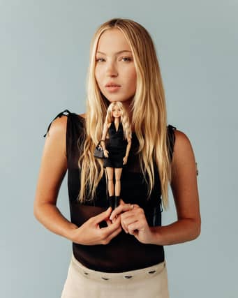 Model Lila Moss with her one of a kind Barbie doll.