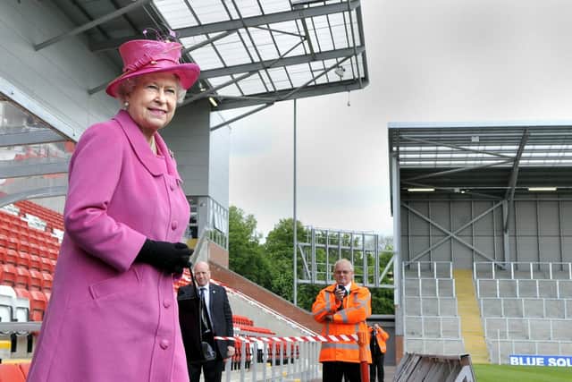 HRH The Queen walks onto the pitch for the official opening of the Leigh Sports Village, May 2009