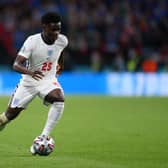 Bukayo Saka has said social media platforms are not doing enough to stop online abuse after he was racially targetted for missing a penalty against Italy (Getty Images)